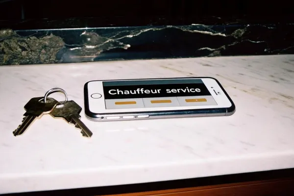 2000s---open-briefcase-with-champagne-and-boarding.jpg